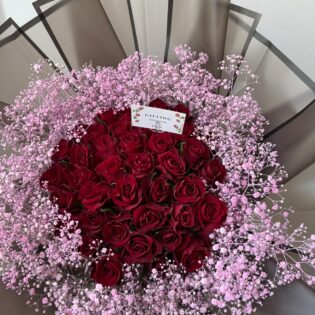 Red Roses and Pink Baby's Breath Bouquet